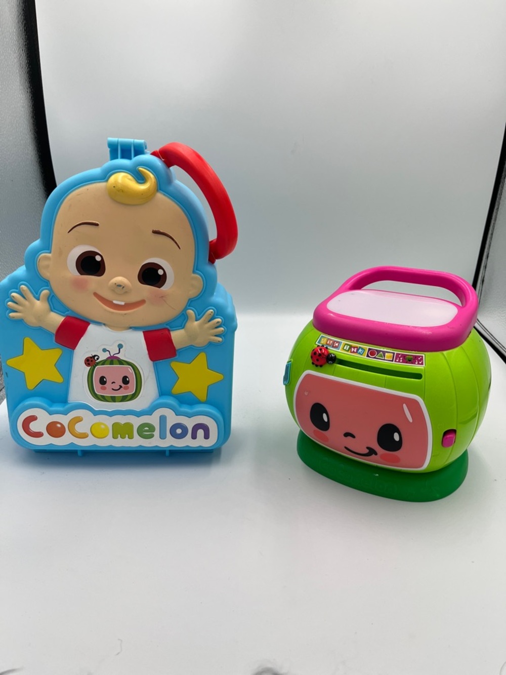 CoComelon Blue Carry Case Toy with Red handle and electronic drum